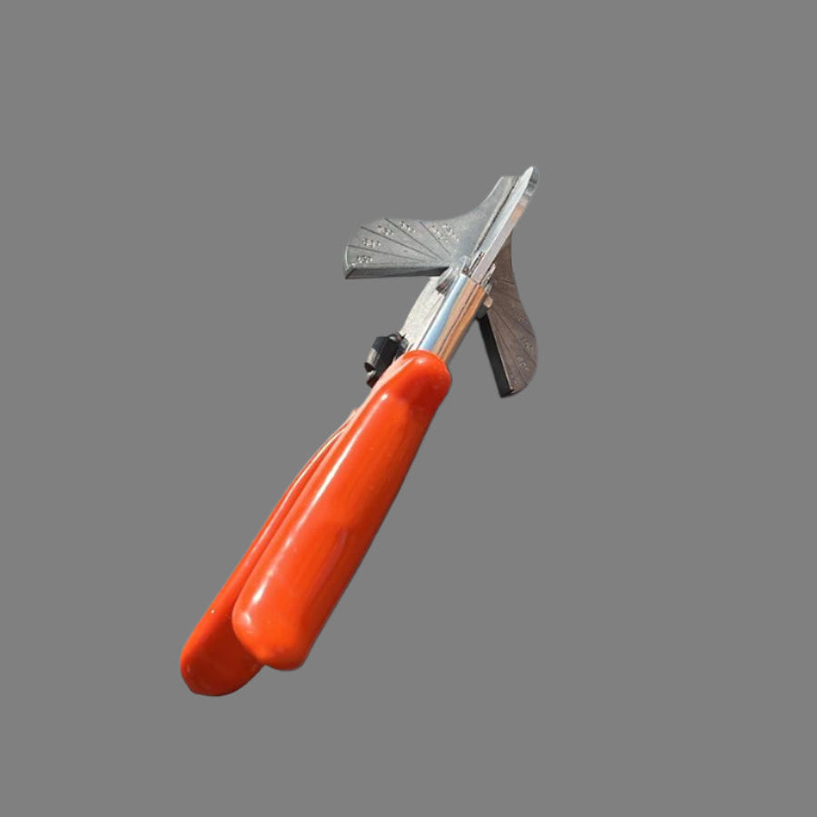 Plintenschaar met oranje handvat