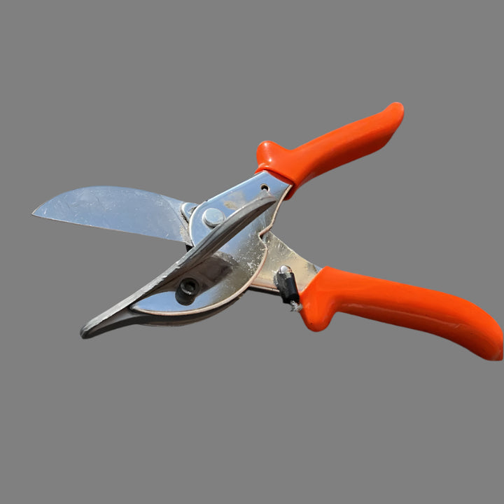 Plintenschaar met oranje handvat
